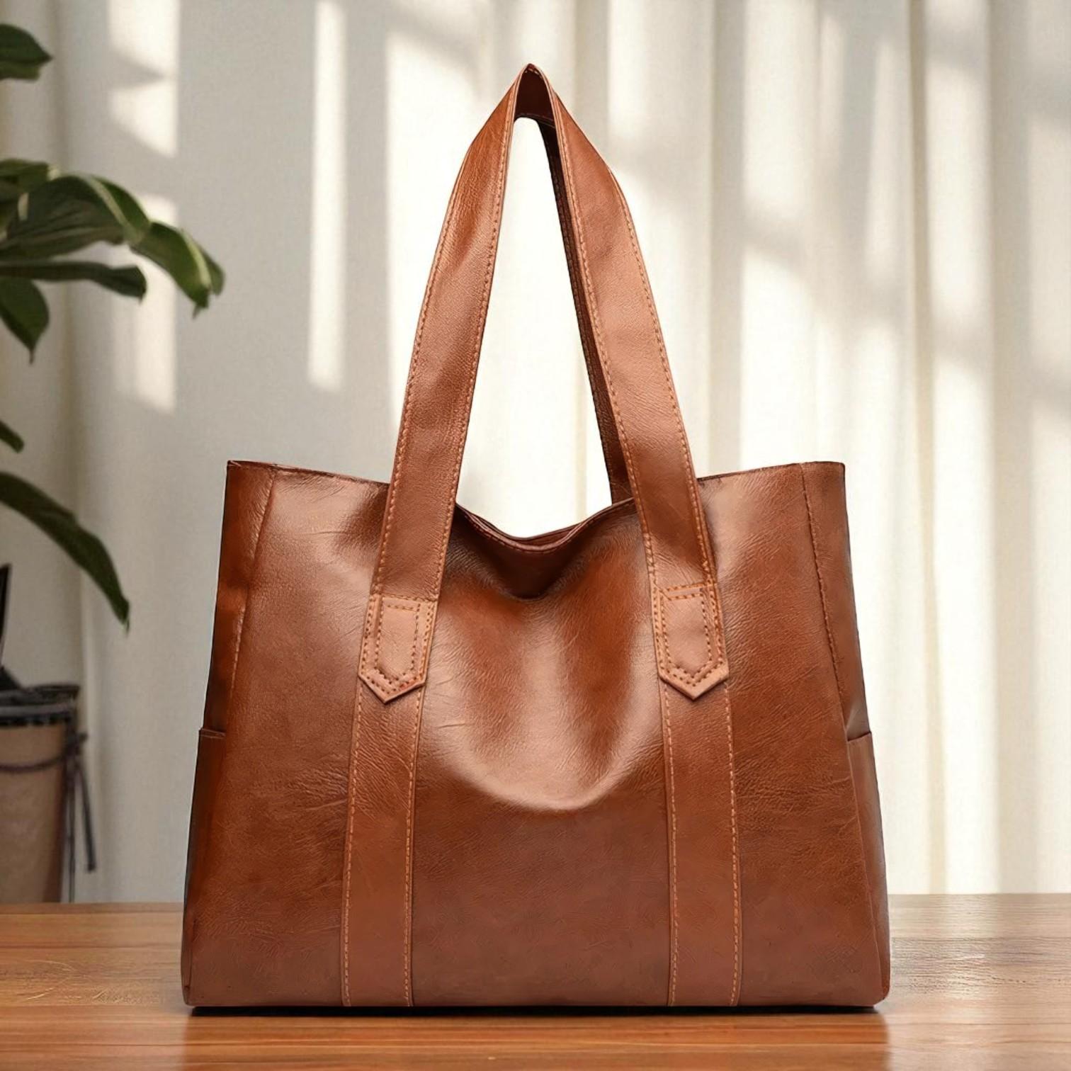 Clásica y elegante cartera de mano siempre con estilo | La elegancia de Noga