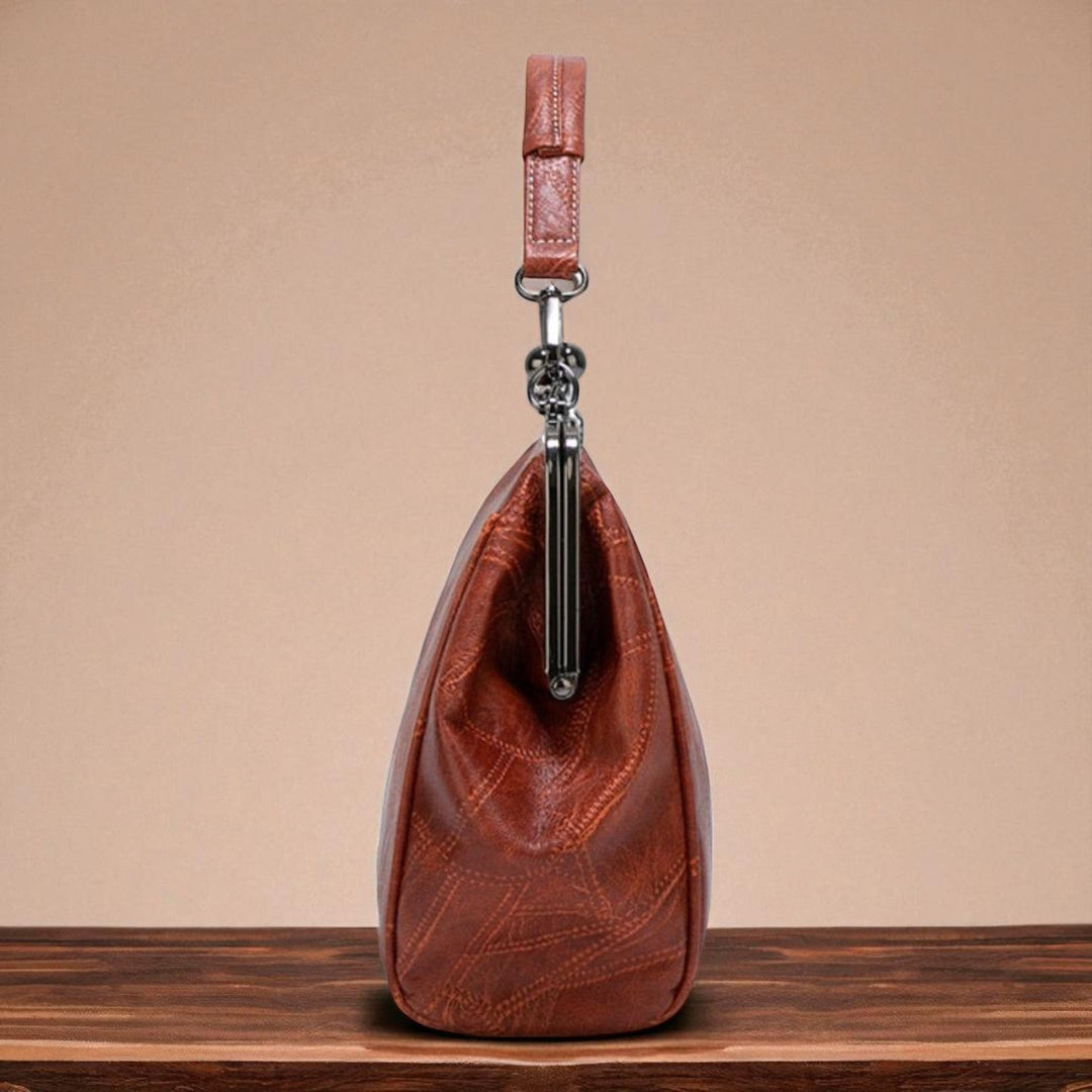 Bolso vintage de mano con cierre de clic