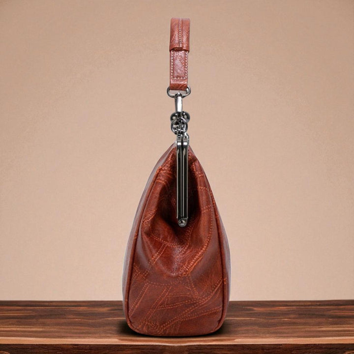 Bolso vintage de mano con cierre de clic