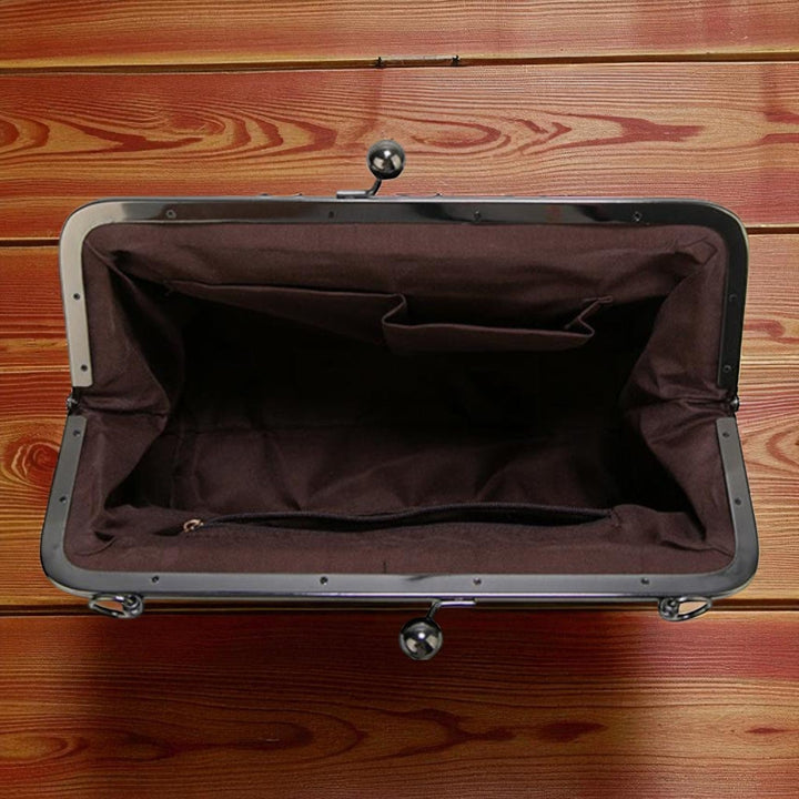 Bolso vintage de mano con cierre de clic