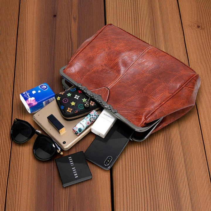 Bolso vintage de mano con cierre de clic