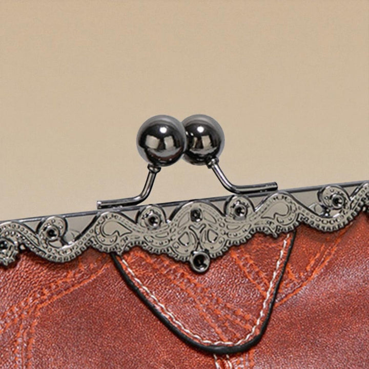 Bolso vintage de mano con cierre de clic
