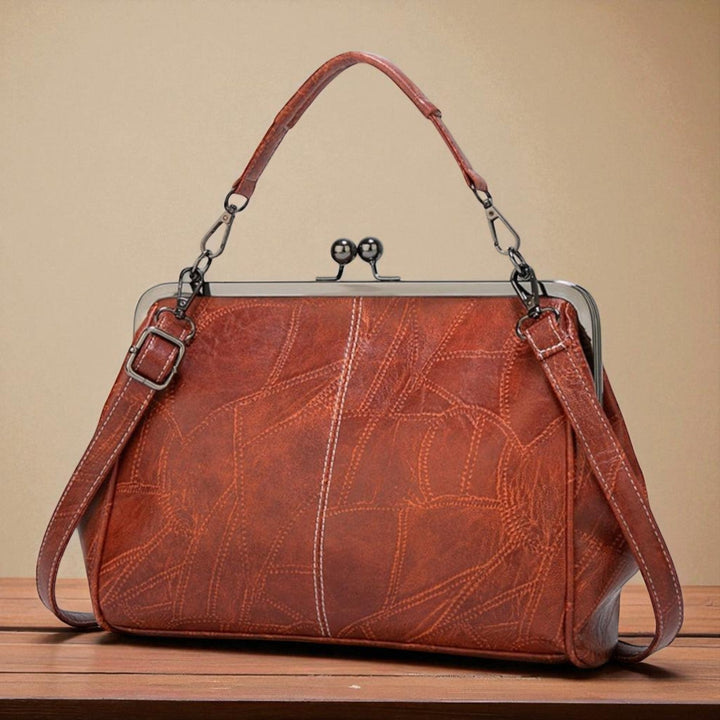 Bolso vintage de mano con cierre de clic