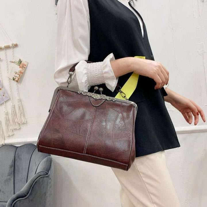 Bolso vintage de mano con cierre de clic