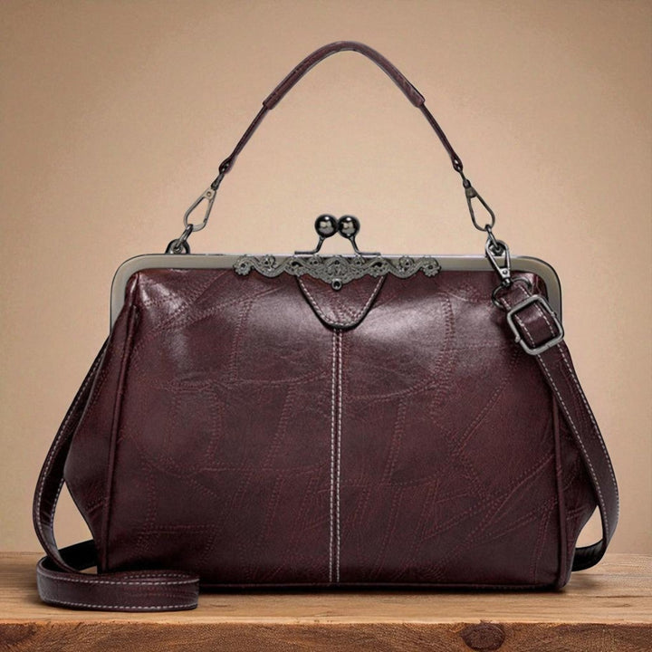 Bolso vintage de mano con cierre de clic