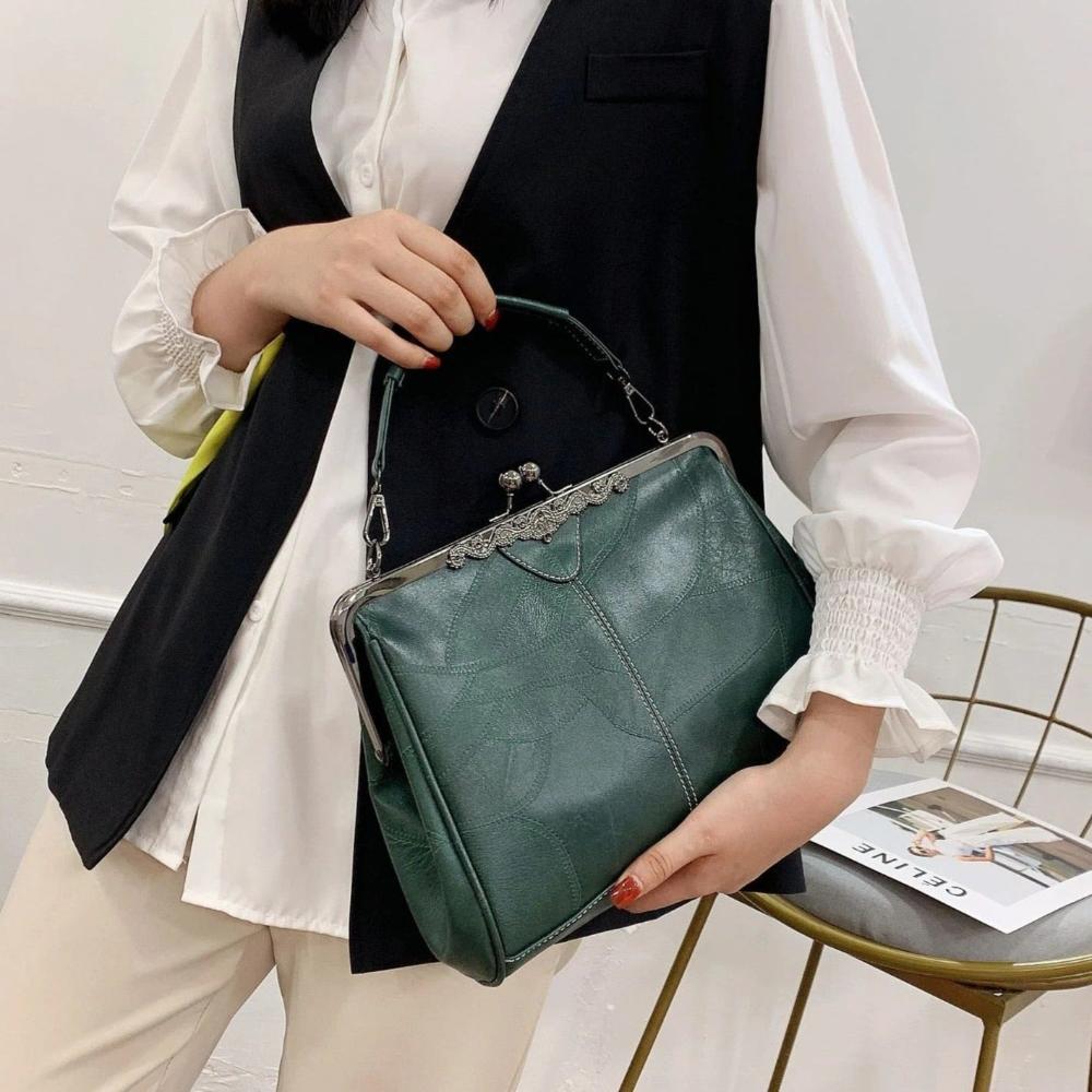Bolso vintage con candado con llave